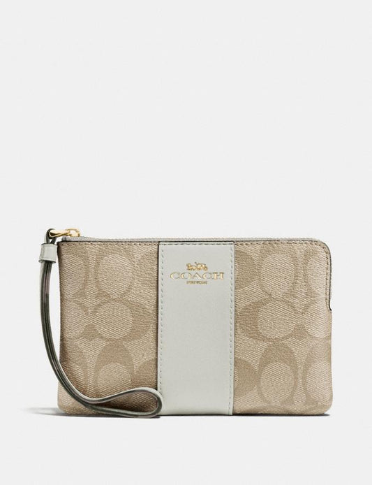 Coach Corner Zip Wristlet in Signature Canvas